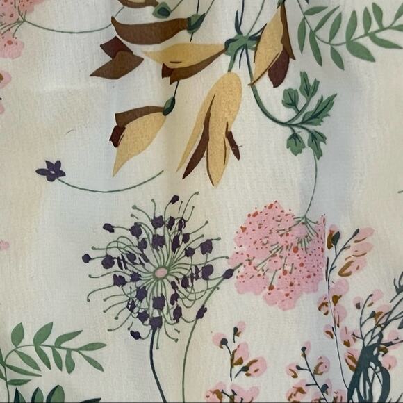 NWT Ellison Floral Romper. Ruffle front with elastic waist. Size small. - Picture 6 of 6